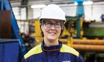 Female employee with safety equipment