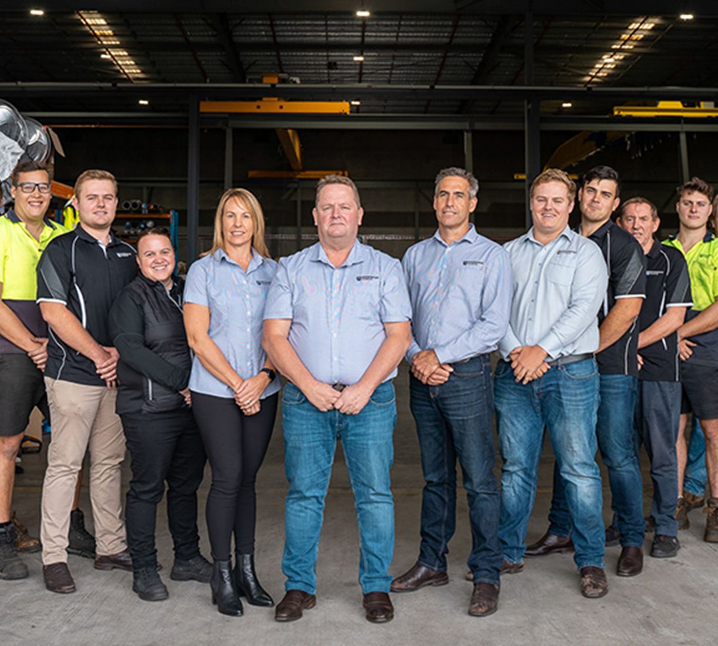 Group of professionals standing together at Ovako facility