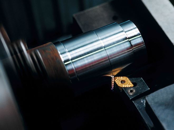 Machining a steel component, showing precision cutting in progress