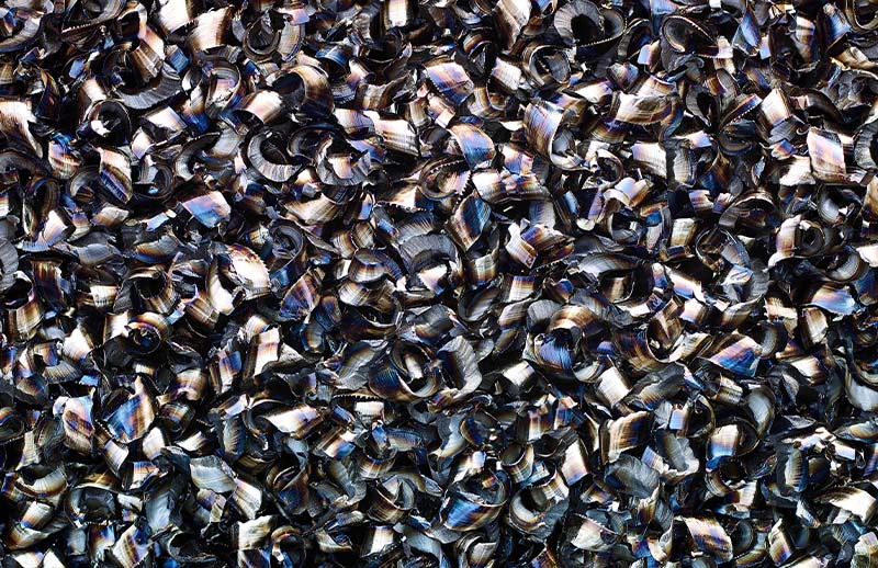 Close-up of steel shavings produced during machining