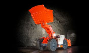 Red Sandvik dumper in mining environment